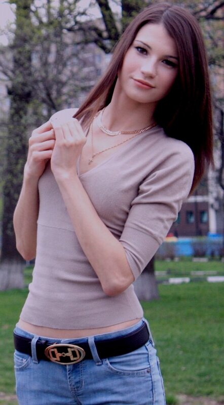 woman in beige top outdoors
