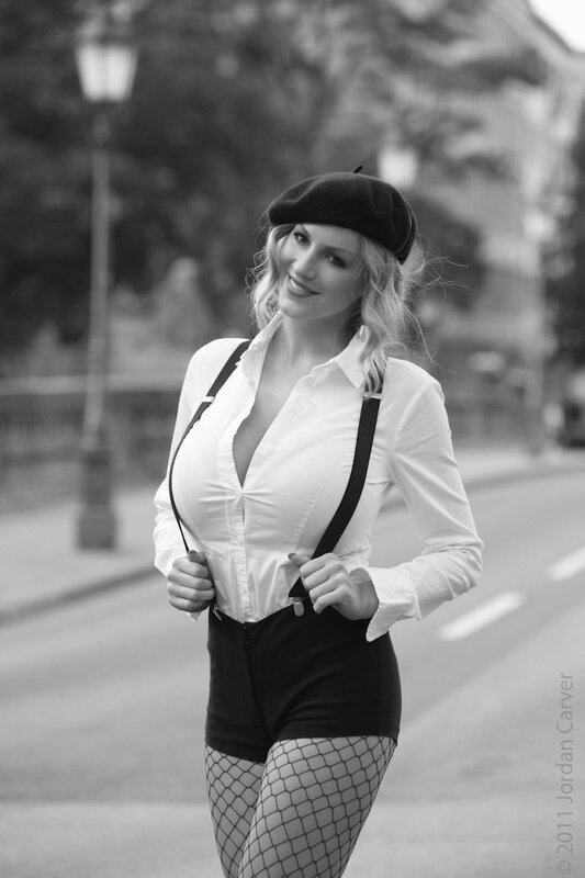 woman in beret and fishnet stockings