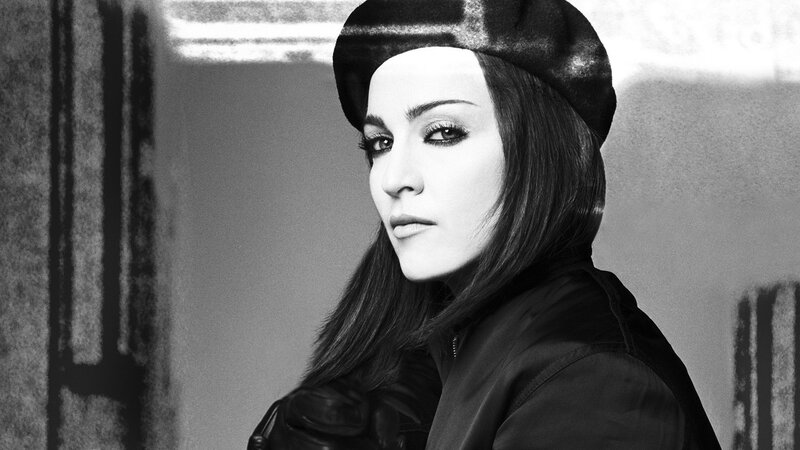 woman in beret and jacket
