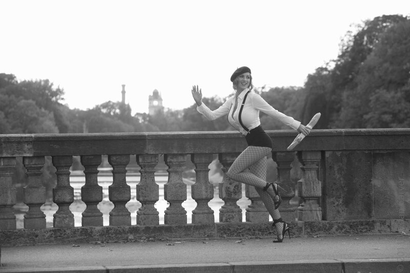 woman in beret on bridge