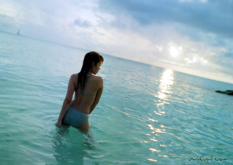 Woman in bikini at ocean