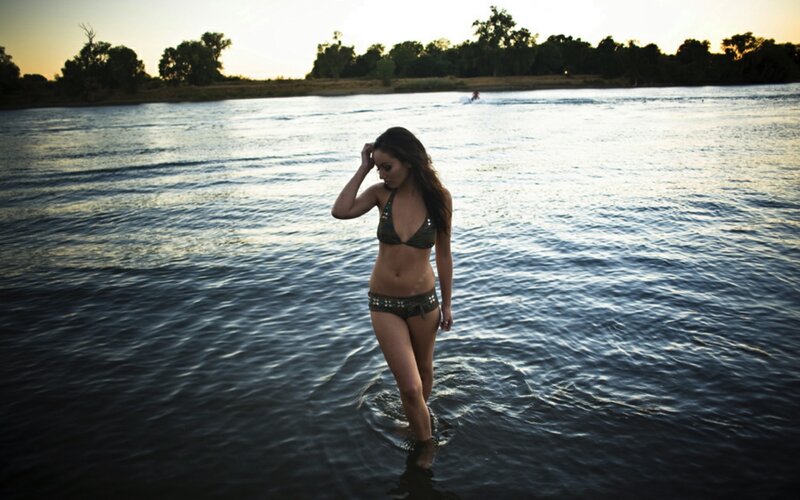 woman in bikini at river
