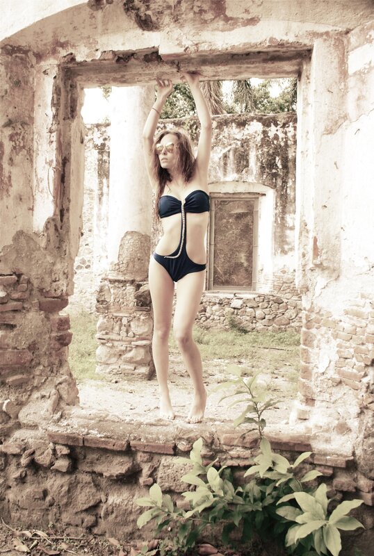 woman in bikini at ruins