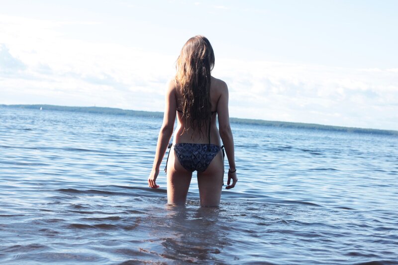woman in bikini at the lake