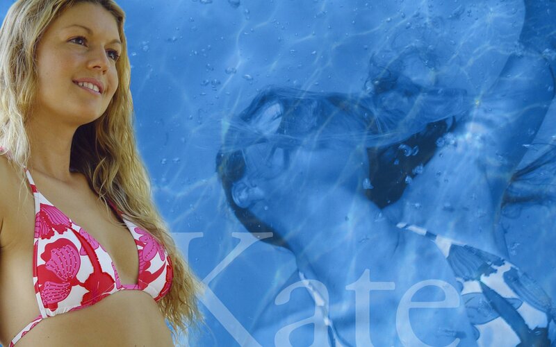woman in bikini by pool