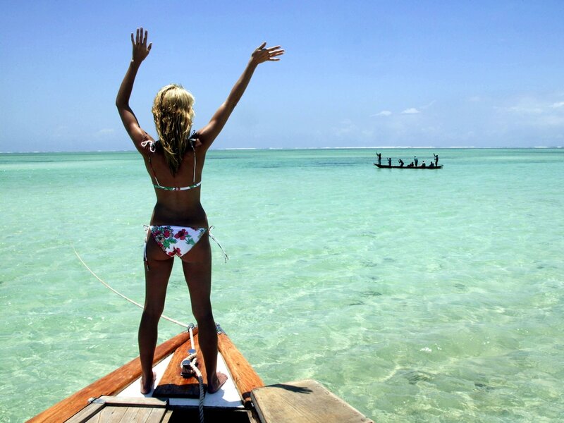 Woman in bikini on boat
