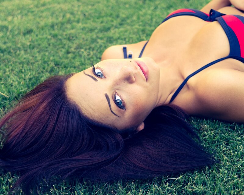woman in bikini on grass