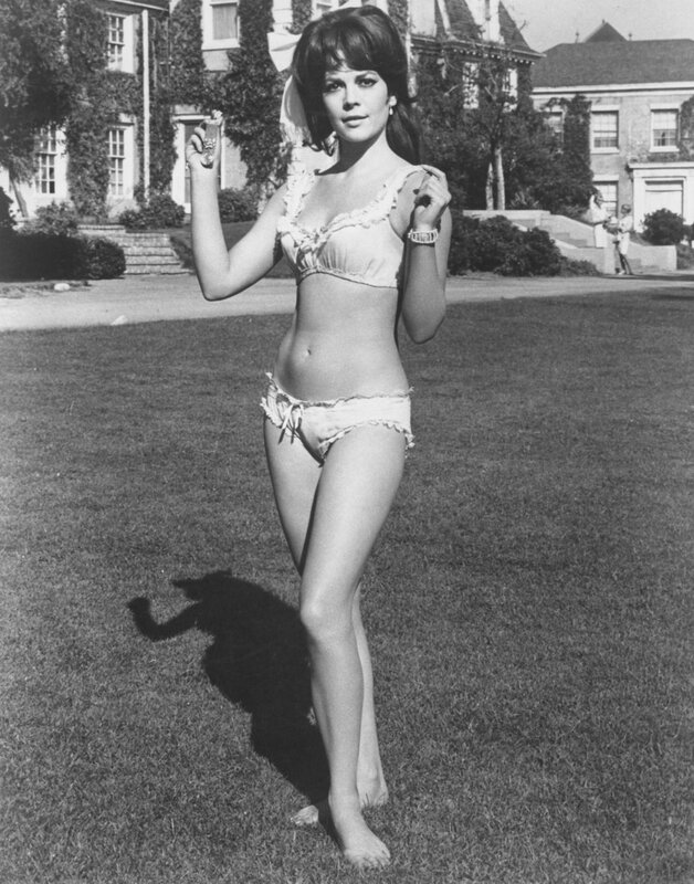 Woman in bikini on lawn