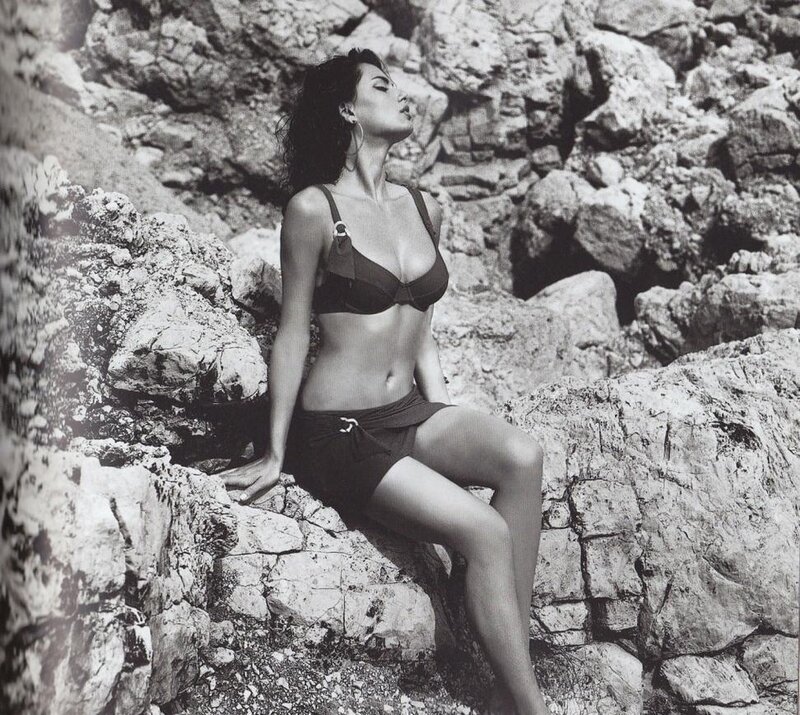 Woman in Bikini on Rocks — Black, Dramatic