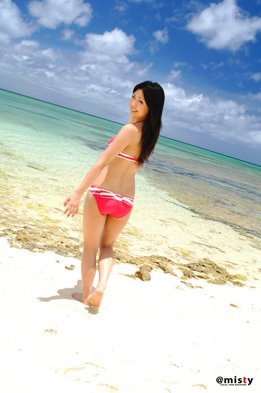 Woman in bikini on tropical beach