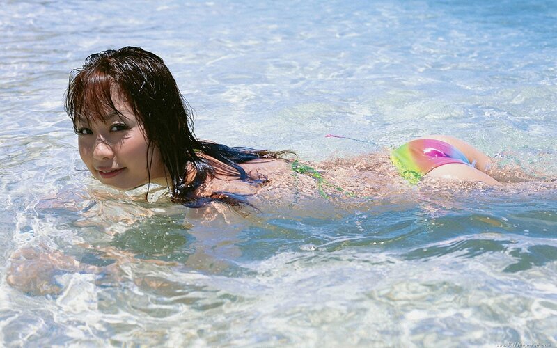 woman in bikini swimming