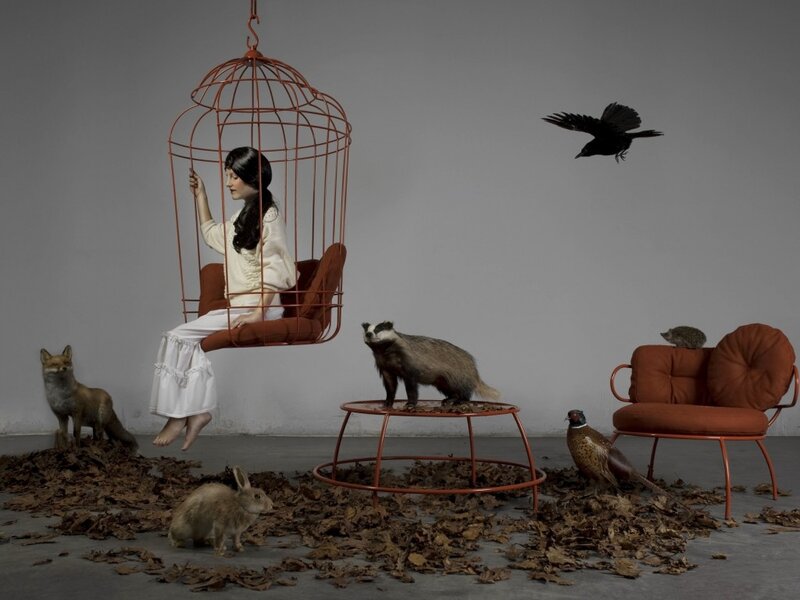 Woman in Birdcage Chair — Gray