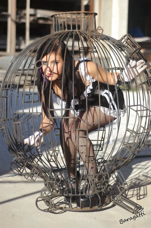 woman in birdcage costume