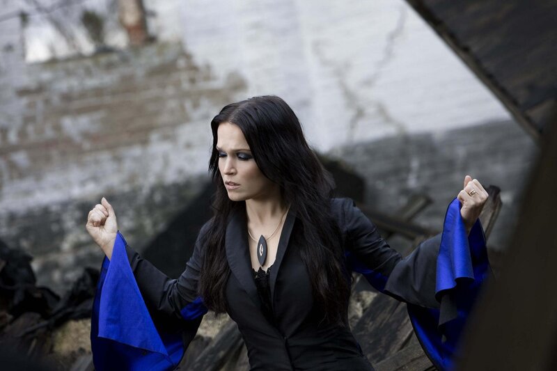 Woman in Black and Blue Coat