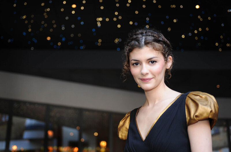woman in black and gold dress