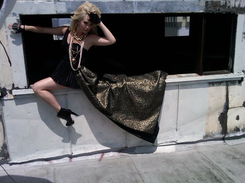 Woman in Black and Gold Dress — Dramatic, Afternoon