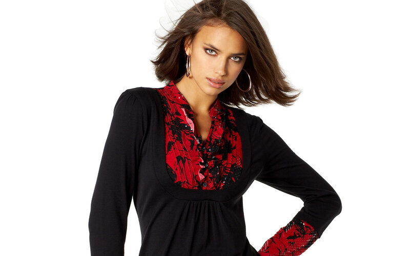 woman in black and red blouse