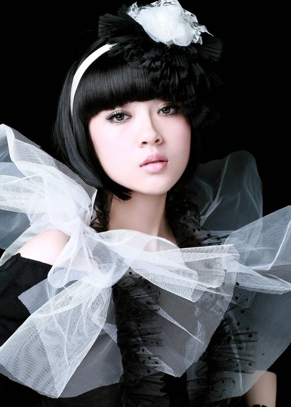 woman in black and white attire