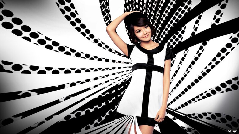 Woman in Black and White Dress — Confident, Photograph, Background Pattern