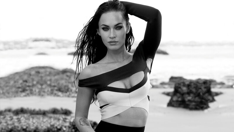 woman in black and white on beach