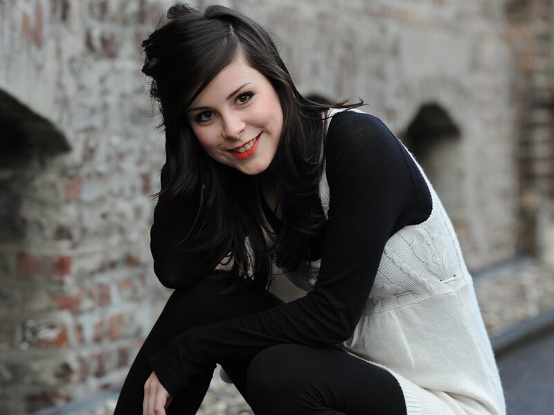 woman in black and white outfit
