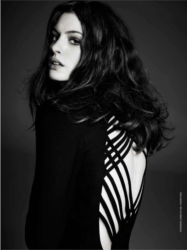 woman in black and white striped dress