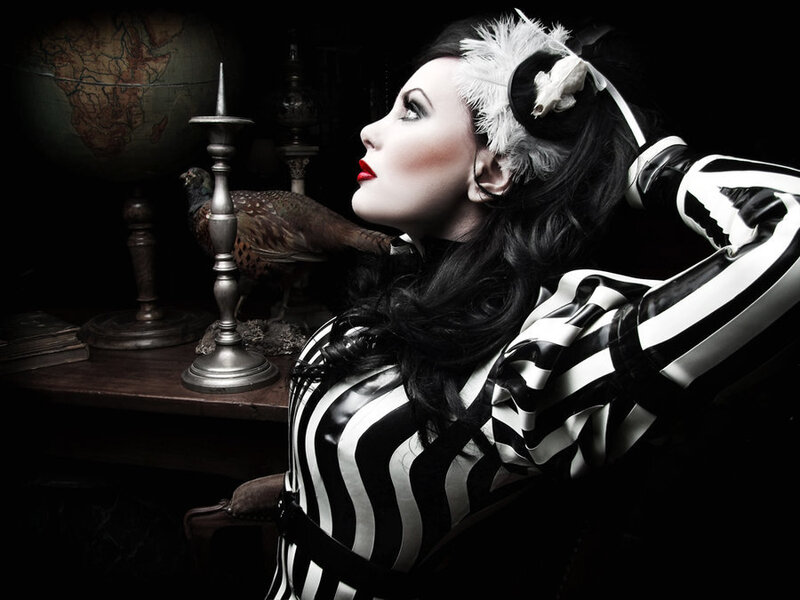 woman in black and white striped outfit
