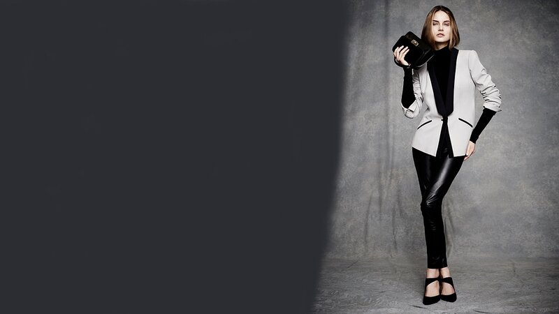 Woman in Black and White Suit