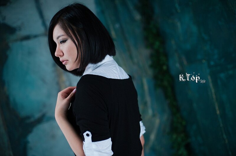 woman in black and white top