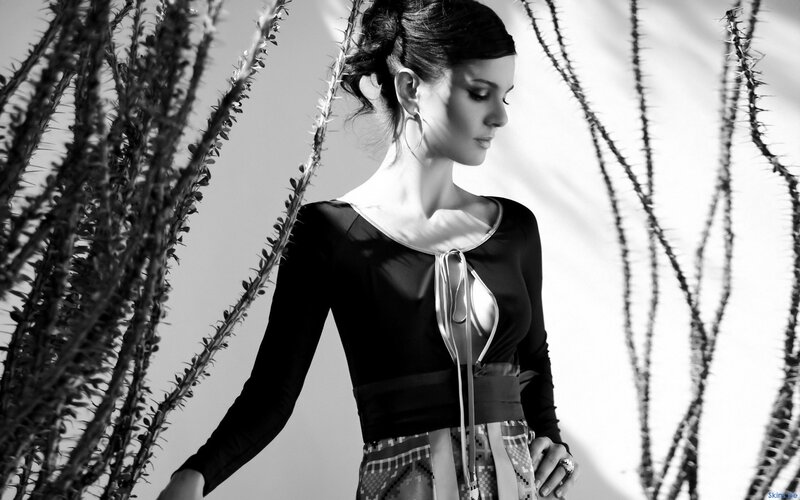 woman in black and white with cactus