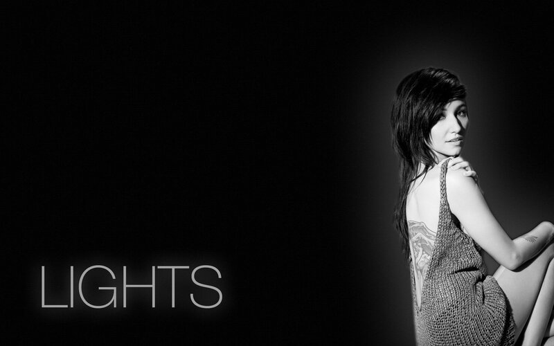 woman in black and white with lights