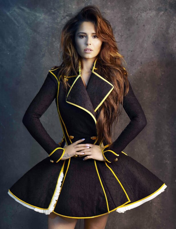woman in black and yellow coat