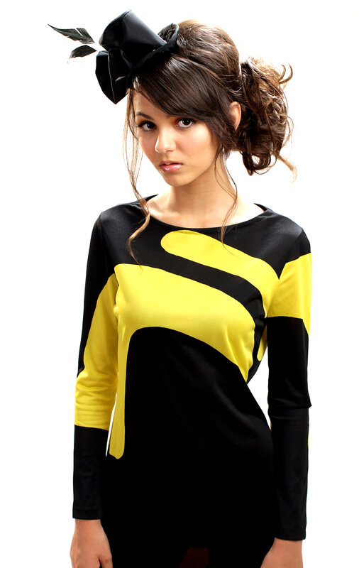woman in black and yellow dress