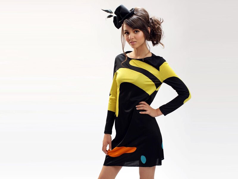 Woman in Black and Yellow Dress — Confident