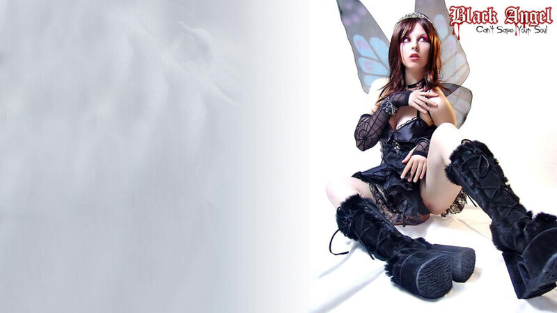 Woman in Black Angel Costume — Dramatic