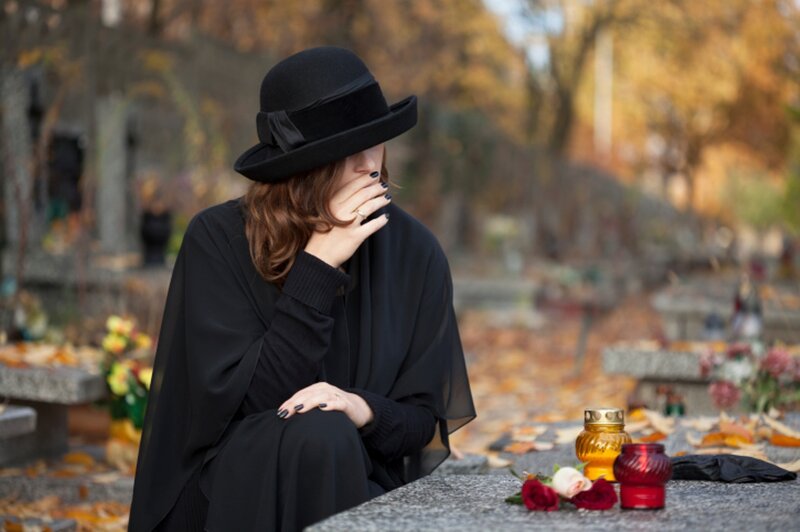 Woman in Black at Cemetery