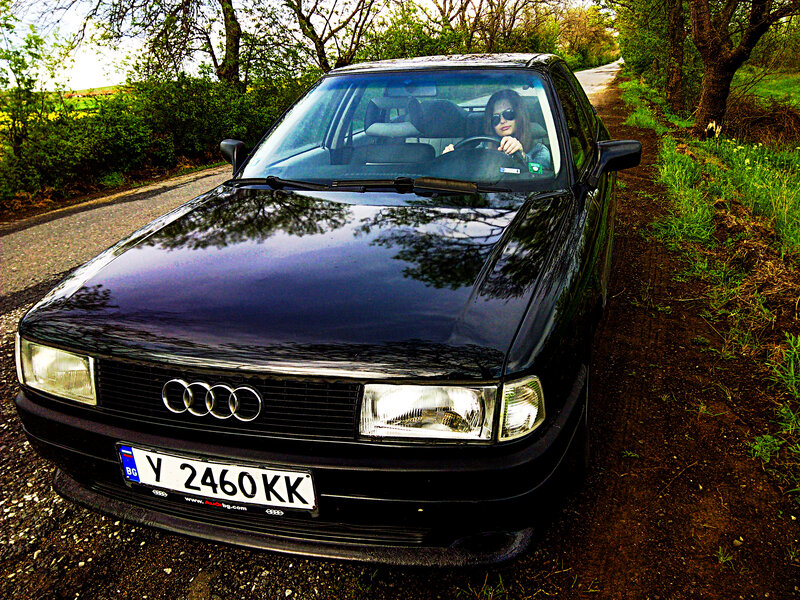 Woman in Black Audi