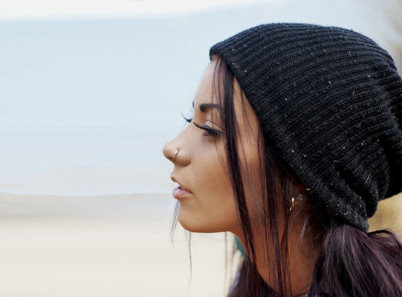 woman in black beanie