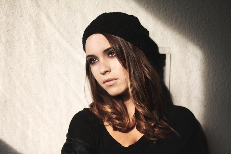 woman in black beanie