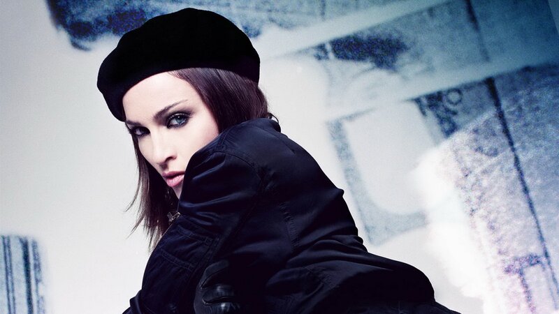 woman in black beret and jacket