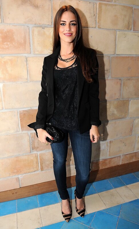 woman in black blazer and jeans