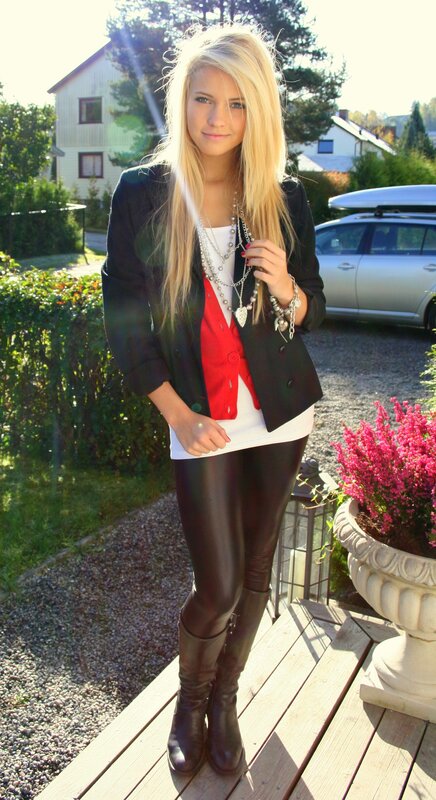 woman in black blazer and leather pants