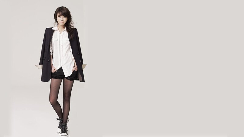 woman in black blazer and shorts