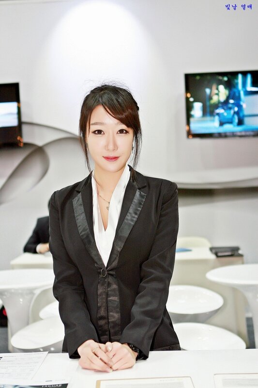 woman in black blazer at event