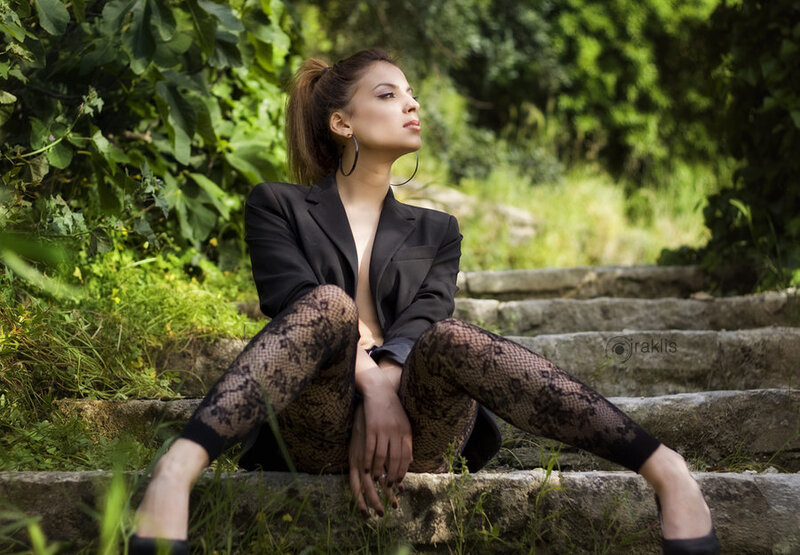Woman in Black Blazer — Contemplative, Afternoon