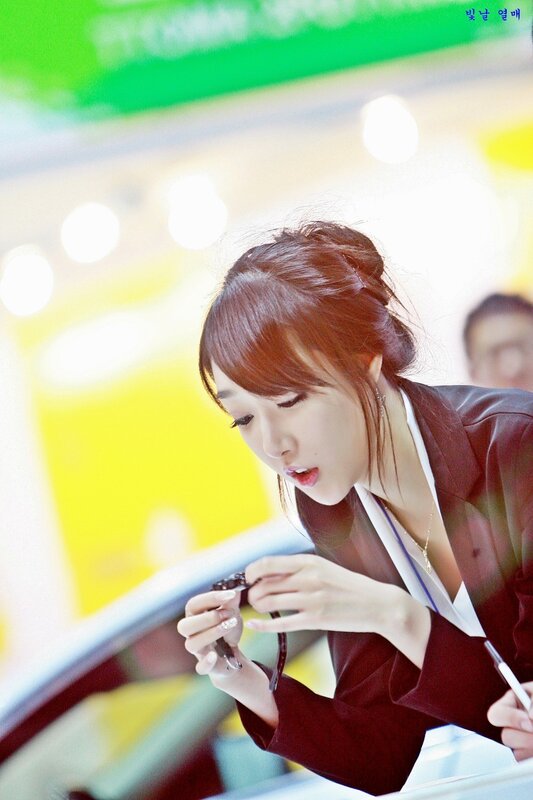 Woman in Black Blazer — Focused