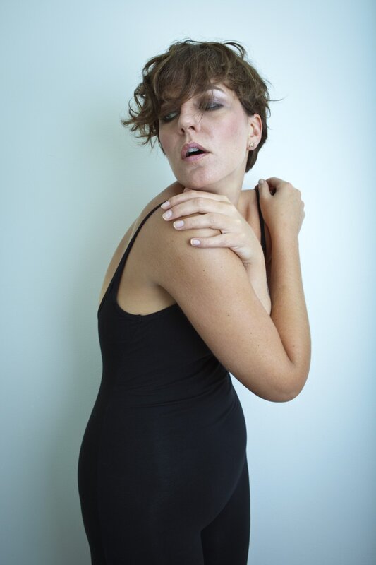 woman in black bodysuit
