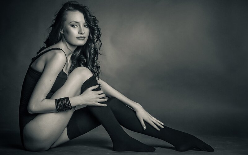 woman in black bodysuit