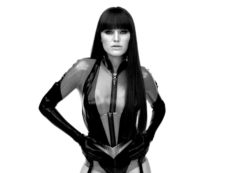 Woman in Black Bodysuit — Confident, Photograph, Long Hair, Zipper, Gloves, White