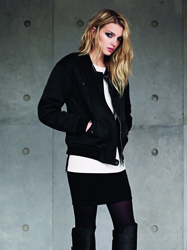woman in black bomber jacket